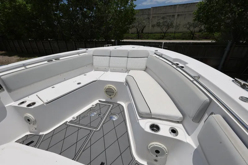 Slide: The Image of 2020 Sea Fox 328 Commander boat interior with white seating and sleek design. - 20