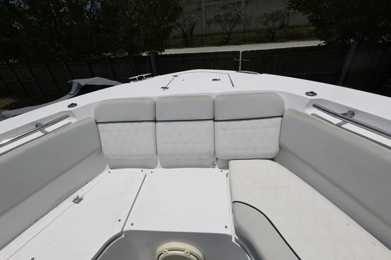 Slide: The Image of 2020 Sea Fox 328 Commander boat interior with white cushioned seating. - 21