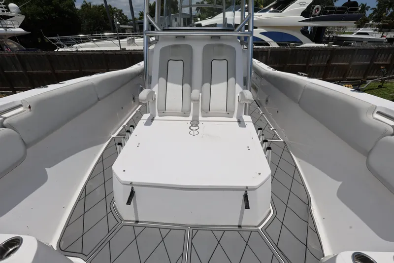 Slide: The Image of 2020 Sea Fox 328 Commander boat interior with seating and storage compartments. - 23