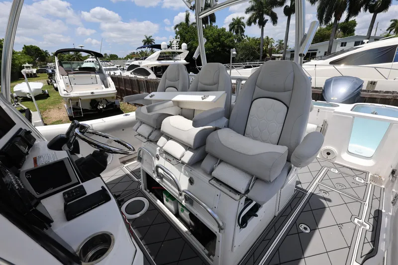 Slide: The Image of 2020 Sea Fox 328 Commander boat interior with luxurious seating and modern controls. - 27