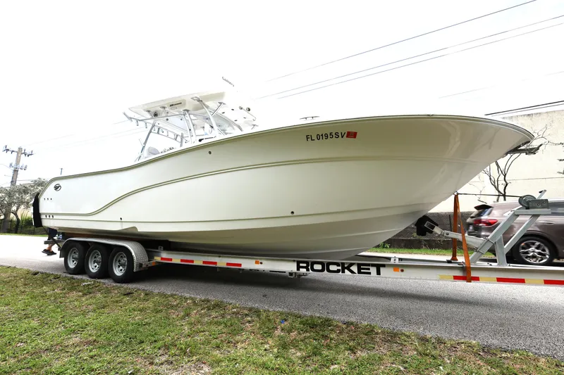 Slide: The Image of 2020 Sea Fox 328 Commander boat on trailer, side view. - 9