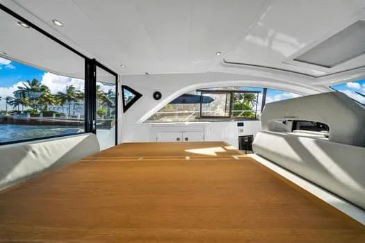 Slide: The Image of 2023 Beneteau Gran Turismo 45 interior with modern design and spacious seating area. - 14