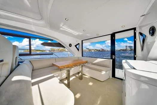 Slide: The Image of Luxurious interior of 2023 Beneteau Gran Turismo 45 yacht with panoramic water views. - 18