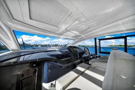 Slide: The Image of Interior view of 2023 Beneteau Gran Turismo 45 yacht, featuring sleek design and waterfront scenery. - 19