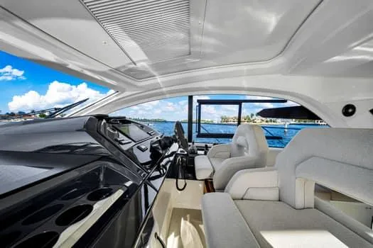 Slide: The Image of Interior of 2023 Beneteau Gran Turismo 45 yacht with modern helm and sea view. - 20