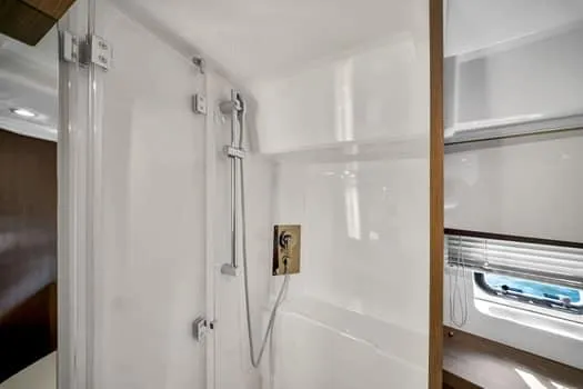 Slide: The Image of 2023 Beneteau Gran Turismo 45 yacht bathroom with modern shower design. - 23