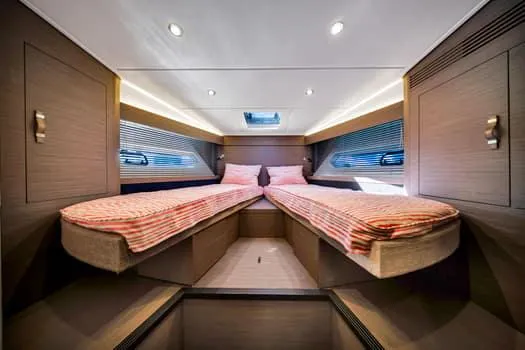 Slide: The Image of 2023 Beneteau Gran Turismo 45 cabin interior with twin beds and modern design. - 33