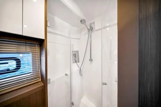 Slide: The Image of Luxurious shower in 2023 Beneteau Gran Turismo 45 yacht, featuring sleek design and modern fixtures. - 43