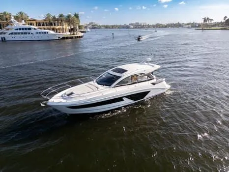 Slide: The Image of 2023 Beneteau Gran Turismo 45 yacht cruising on a sunny day. - 44