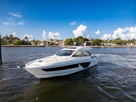 Slide: The Image of 2023 Beneteau Gran Turismo 45 yacht cruising on a sunny day. - 5