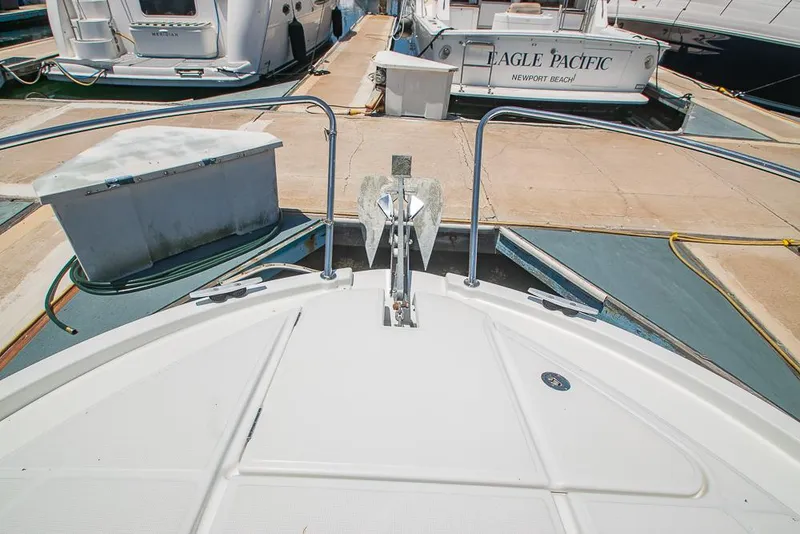 Slide: The Image of Bow view of 2021 Beneteau Antares 8 docked at marina. - 38