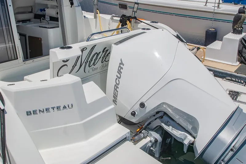 Slide: The Image of Beneteau Antares 8 boat with Mercury engine, 2021 model, docked at marina. - 42