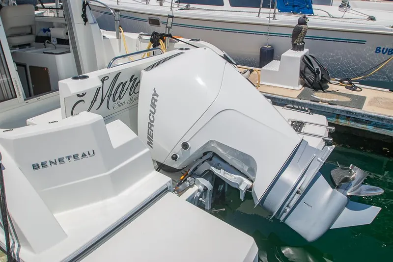 Slide: The Image of Beneteau Antares 8 (2021) with Mercury outboard motor docked at marina. - 43
