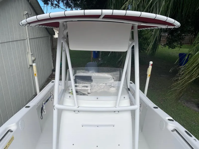 Slide: The Image of 2012 Tidewater 220 CC Adventure boat with T-top and center console. - 7