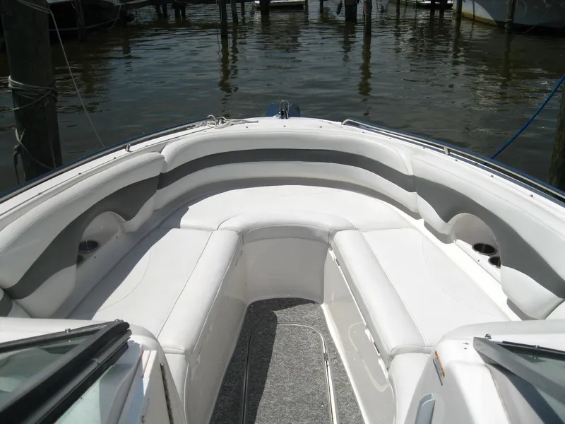 Slide: The Image of 2005 Chaparral 280 SSi boat interior with white seating and gray accents. - 17