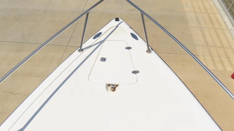 Slide: The Image of Bow of 2002 Fountain 38 TE boat with stainless steel railings. - 22