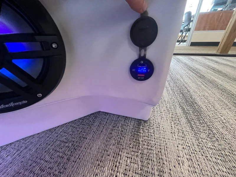 Slide: The Image of 2025 Bennington 27RSBWAT2 speaker and digital display on a boat interior. - 12