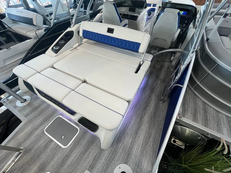 Slide: The Image of 2025 Bennington 27RSBWAT2 boat interior with luxurious seating and modern design. - 14