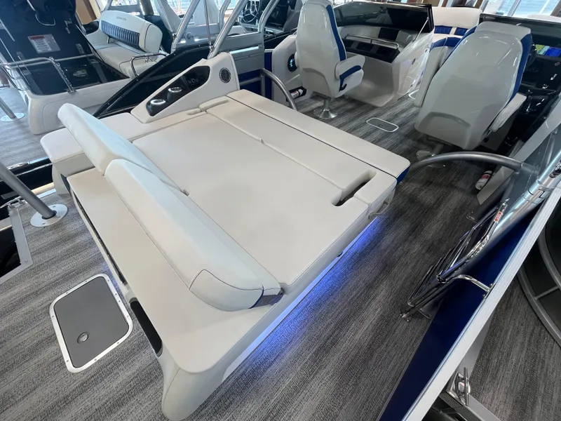 Slide: The Image of 2025 Bennington 27RSBWAT2 boat interior with luxurious seating and modern design. - 17