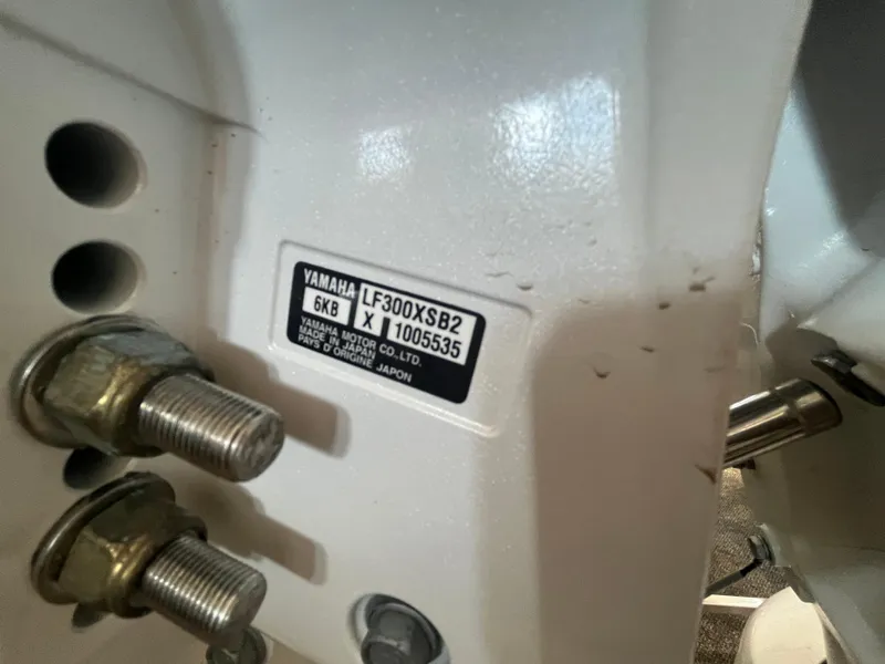 Slide: The Image of Close-up of Yamaha LF300XSB2 engine label on 2025 Bennington 27RSBWAT2 boat. - 21