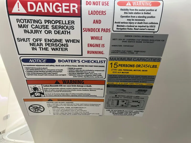Slide: The Image of Safety warnings and capacity limits on a 2025 Bennington 27RSBWAT2 boat. - 23