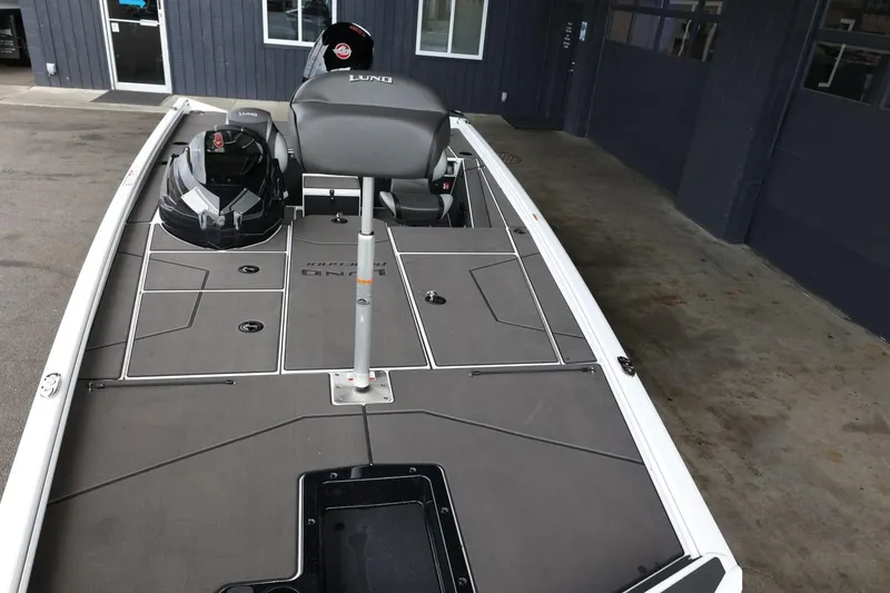 Slide: The Image of 2025 Lund 1875 Renegade SS boat interior with sleek design and modern features. - 12