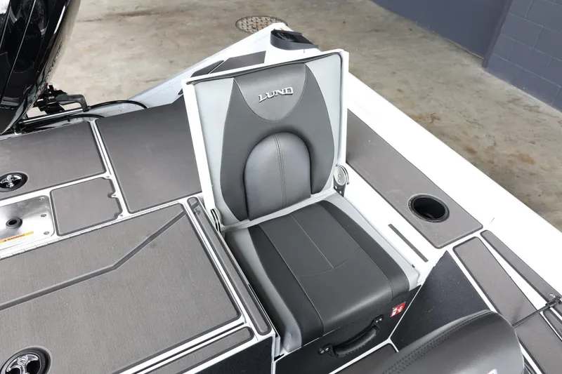 Slide: The Image of 2025 Lund 1875 Renegade SS boat seat, gray and black design, modern and sleek. - 22