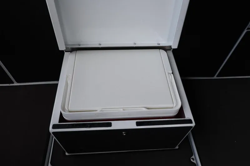 Slide: The Image of Open storage compartment in 2025 Lund 1875 Renegade SS boat. - 25