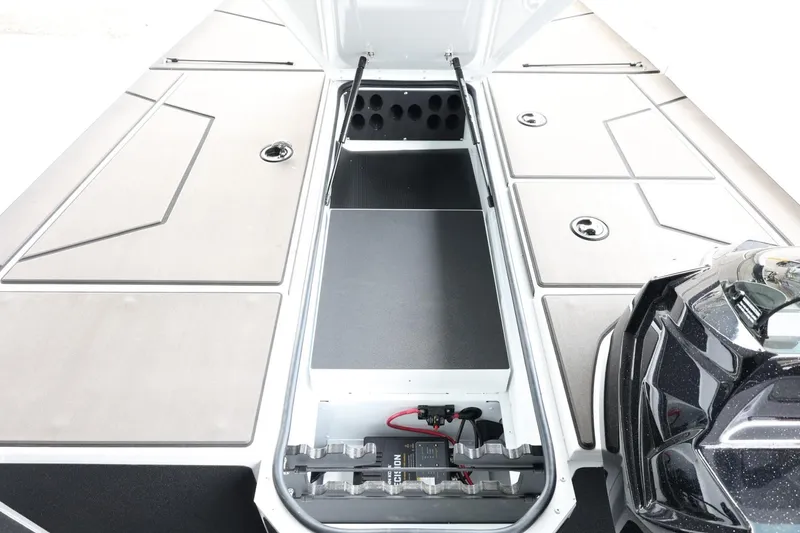 Slide: The Image of 2025 Lund 1875 Renegade SS boat interior with open storage compartment. - 27
