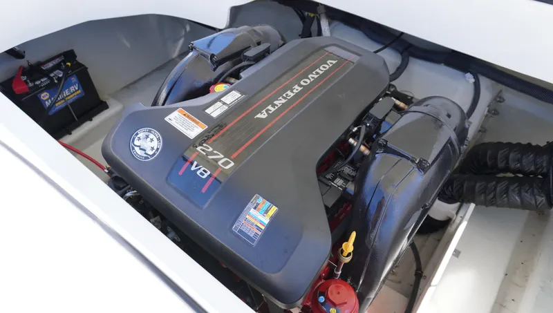 Slide: The Image of 2014 Cobalt 210 boat engine compartment with Volvo Penta 270 V8 engine. - 11