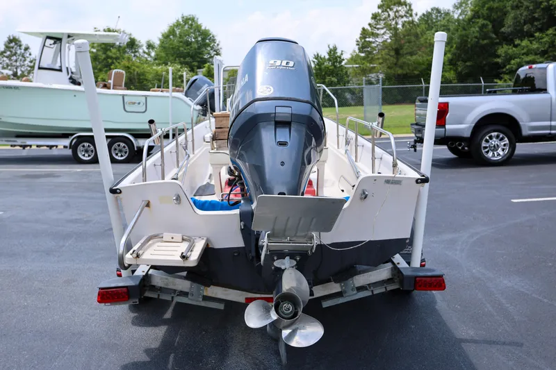 Slide: The Image of 1995 Boston Whaler 17 Montauk boat with Yamaha outboard motor on trailer. - 2