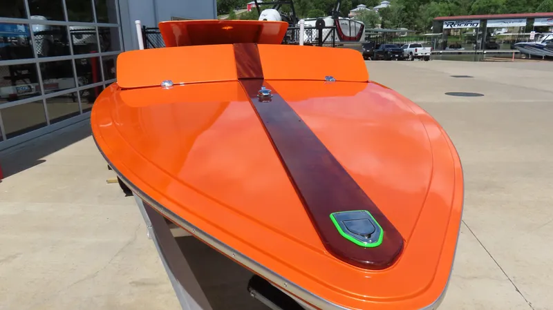 Slide: The Image of Orange 1979 Cigarette 20 speedboat with sleek design and wooden accent. - 8