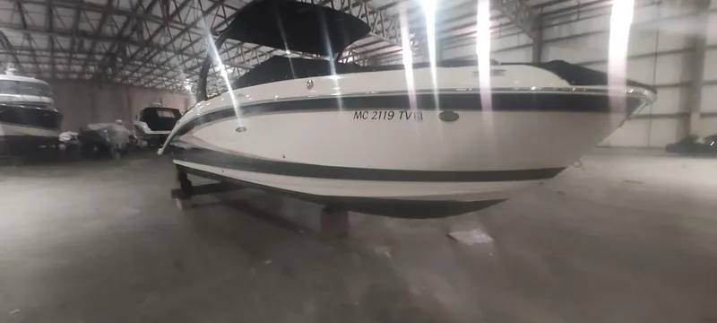 The Image of 2016 Sea Ray 270 Sundeck boat in indoor storage facility. - 0