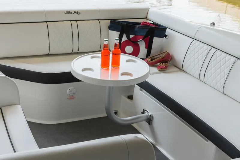 Slide: The Image of 2016 Sea Ray 270 Sundeck boat side view in storage facility. - 12