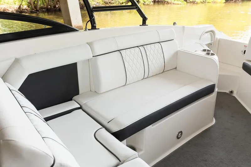 Slide: The Image of 2016 Sea Ray 270 Sundeck boat in storage, partially covered, side view. - 13