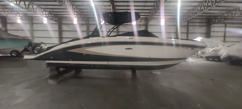 Slide: The Image of 2016 Sea Ray 270 Sundeck boat in indoor storage facility. - 4