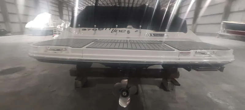 Slide: The Image of 2016 Sea Ray 270 Sundeck boat in indoor storage facility. - 5