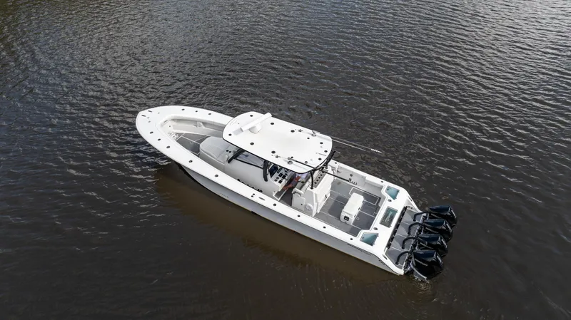 Slide: The Image of 2023 Front Runner 39 Center Console boat on calm water, aerial view. - 10