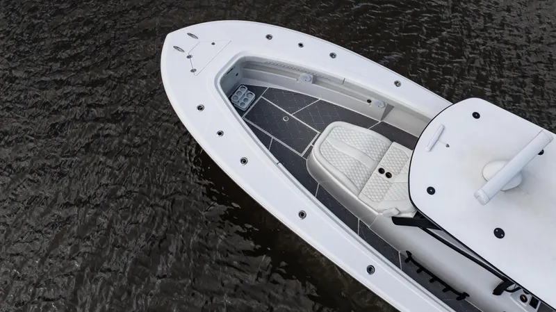 Slide: The Image of 2023 Front Runner 39 Center Console boat on water, aerial view. - 2