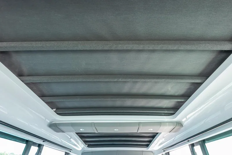 Slide: The Image of Ceiling view of 2023 Axopar 45 Cross Cabin, featuring sleek design and modern lighting. - 15