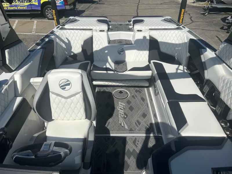 Slide: The Image of 2024 Tigé 22RZX boat interior with luxurious seating and modern design. - 13