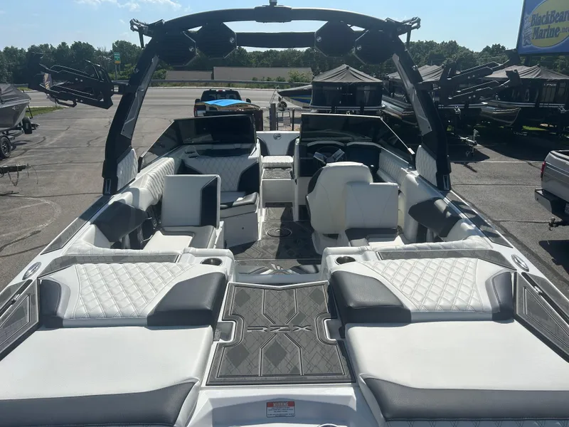 Slide: The Image of 2024 Tigé 22RZX boat interior with luxurious seating and modern design. - 6