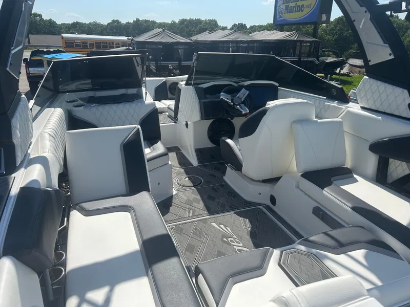 Slide: The Image of 2024 Tigé 22RZX boat interior with modern seating and sleek design. - 7