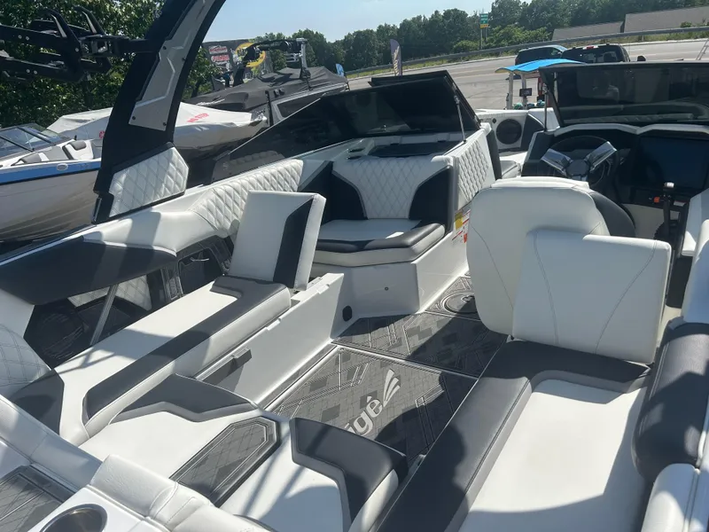 Slide: The Image of 2024 Tigé 22RZX boat interior with luxurious seating and modern design. - 8