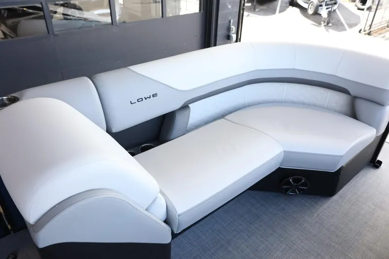 Slide: The Image of Luxurious seating on 2025 Lowe SS 230 DL pontoon boat, featuring sleek, modern design. - 11