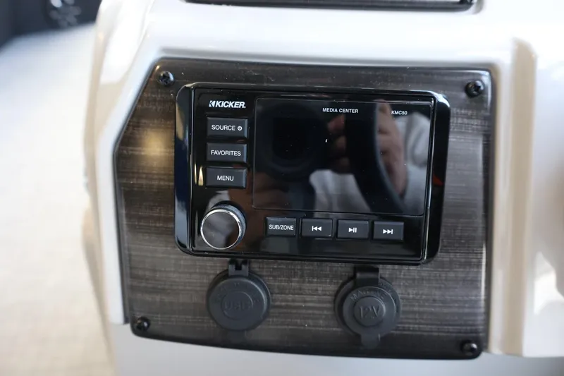 Slide: The Image of Kicker media center on 2025 Lowe SS 230 DL boat dashboard. - 18