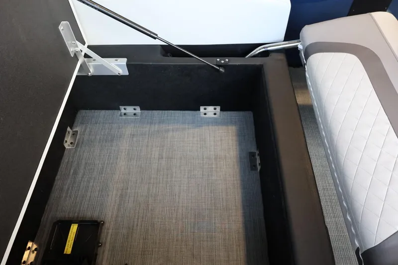 Slide: The Image of Interior storage compartment of 2025 Lowe SS 230 DL boat with seating. - 22