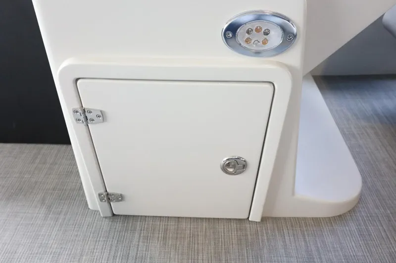 Slide: The Image of 2025 Lowe SS 230 DL boat storage compartment with LED light. - 26