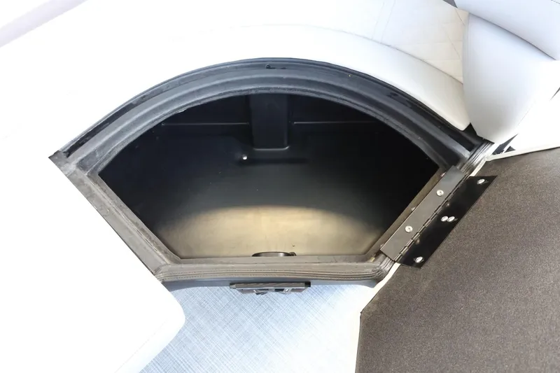 Slide: The Image of Storage compartment in 2025 Lowe SS 230 DL boat, open and empty. - 29