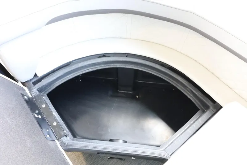 Slide: The Image of Storage compartment in 2025 Lowe SS 230 DL boat, featuring spacious interior design. - 30